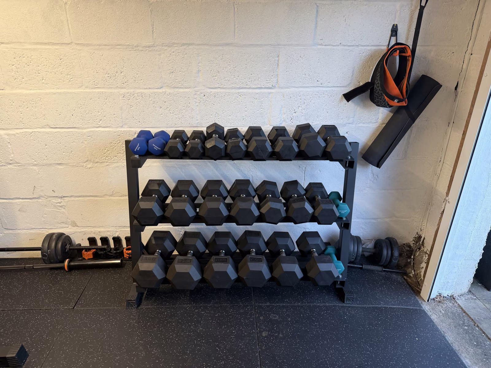 Full rack of dumbbells in the private home gym